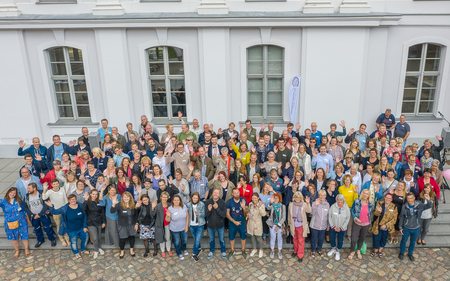 Members of staff in the courtyard of the Historical Campus in 2019 - Photo: Sebastian Parg