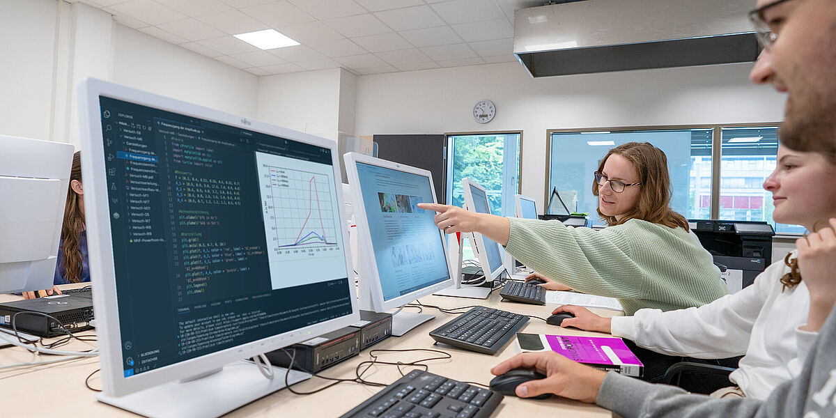 Students at computers in a PC lab