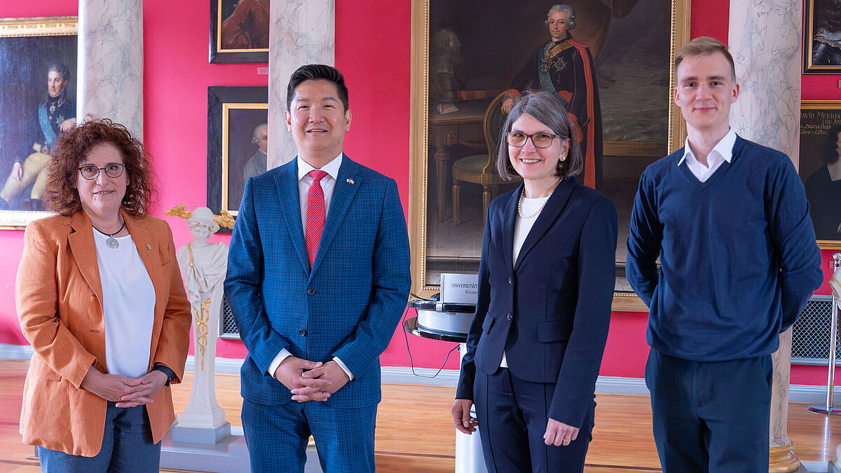 Jason Chue (second from left) was welcomed in the University of Greifswald’s historic Aula